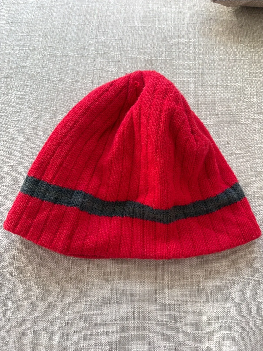 The North Face Red Beanie with Dark Gray Stripe